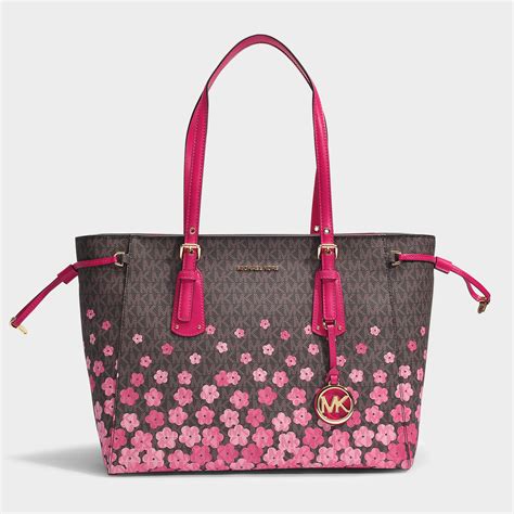 michael kors purses brown with flowers on it|Michael Kors brown tote purses.